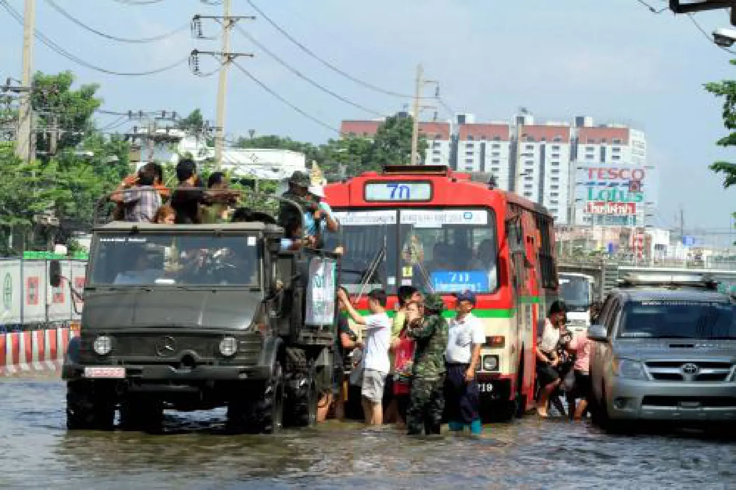 More closures, evacuation as waters enter