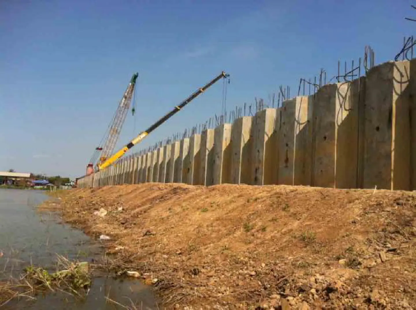 Villagers want court to halt flood barriers Villagers want court to halt flood barriers