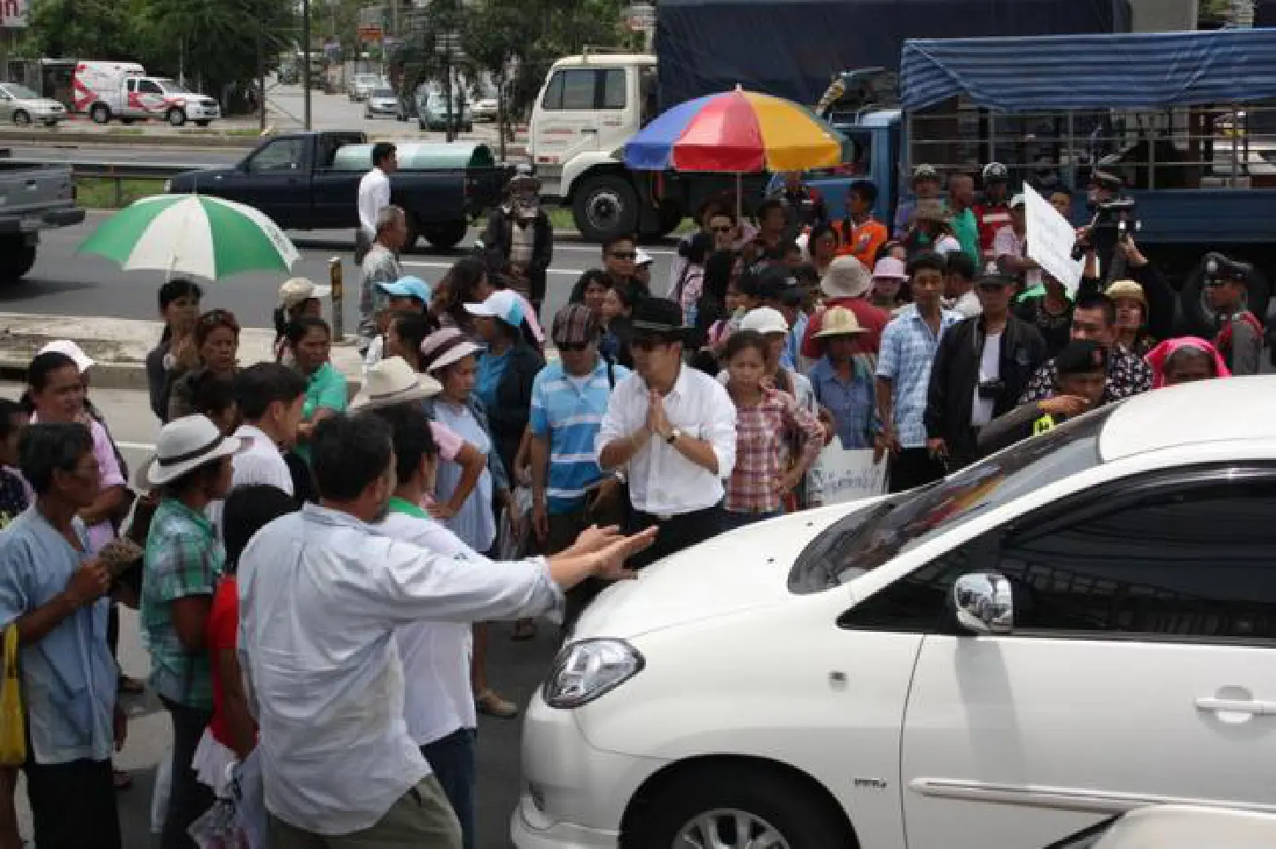 Frustrated flood victims block road Frustrated flood victims block road