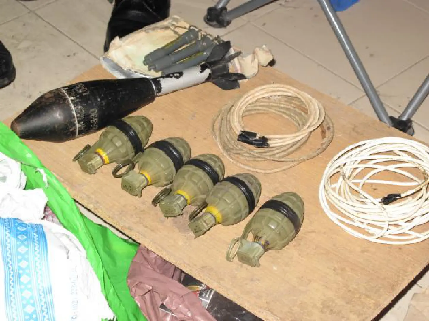 Weapons cache was ex-cop's Weapons cache was ex-cop's