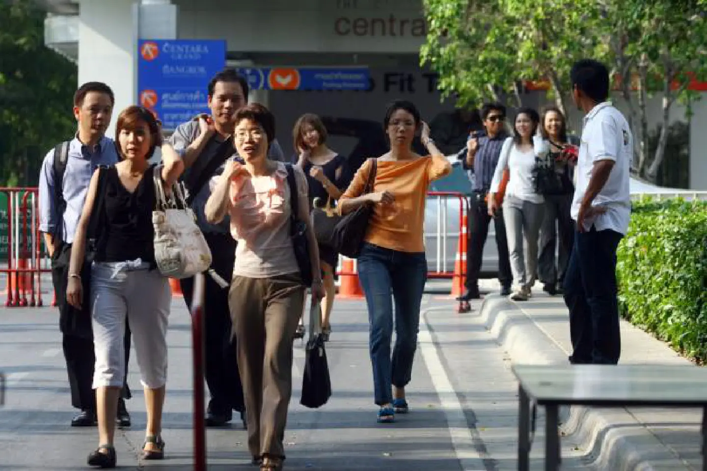 Women in Bangkok found working long hours Women in Bangkok found working long hours