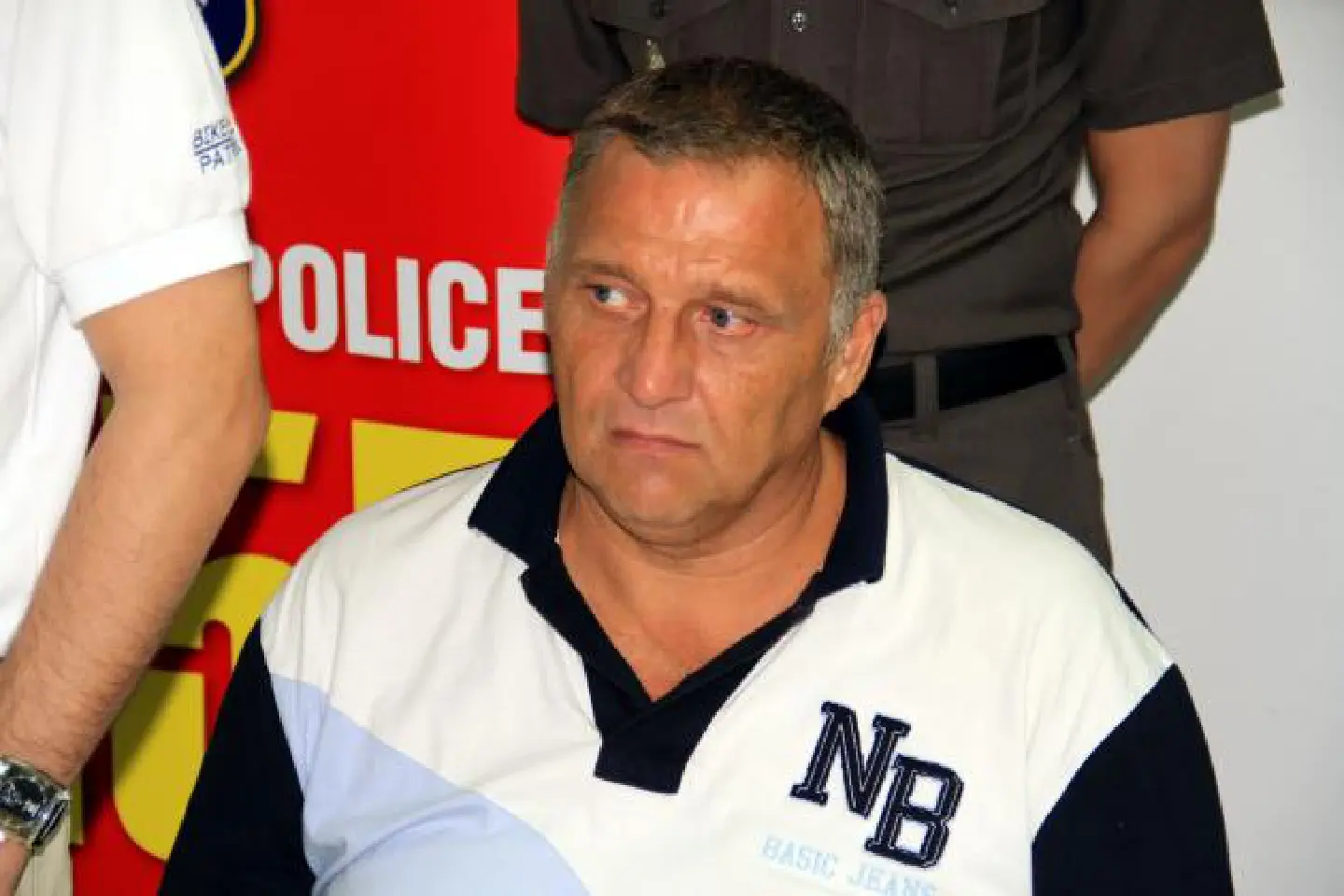 Expat denies role in grisly killing Expat denies role in grisly killing