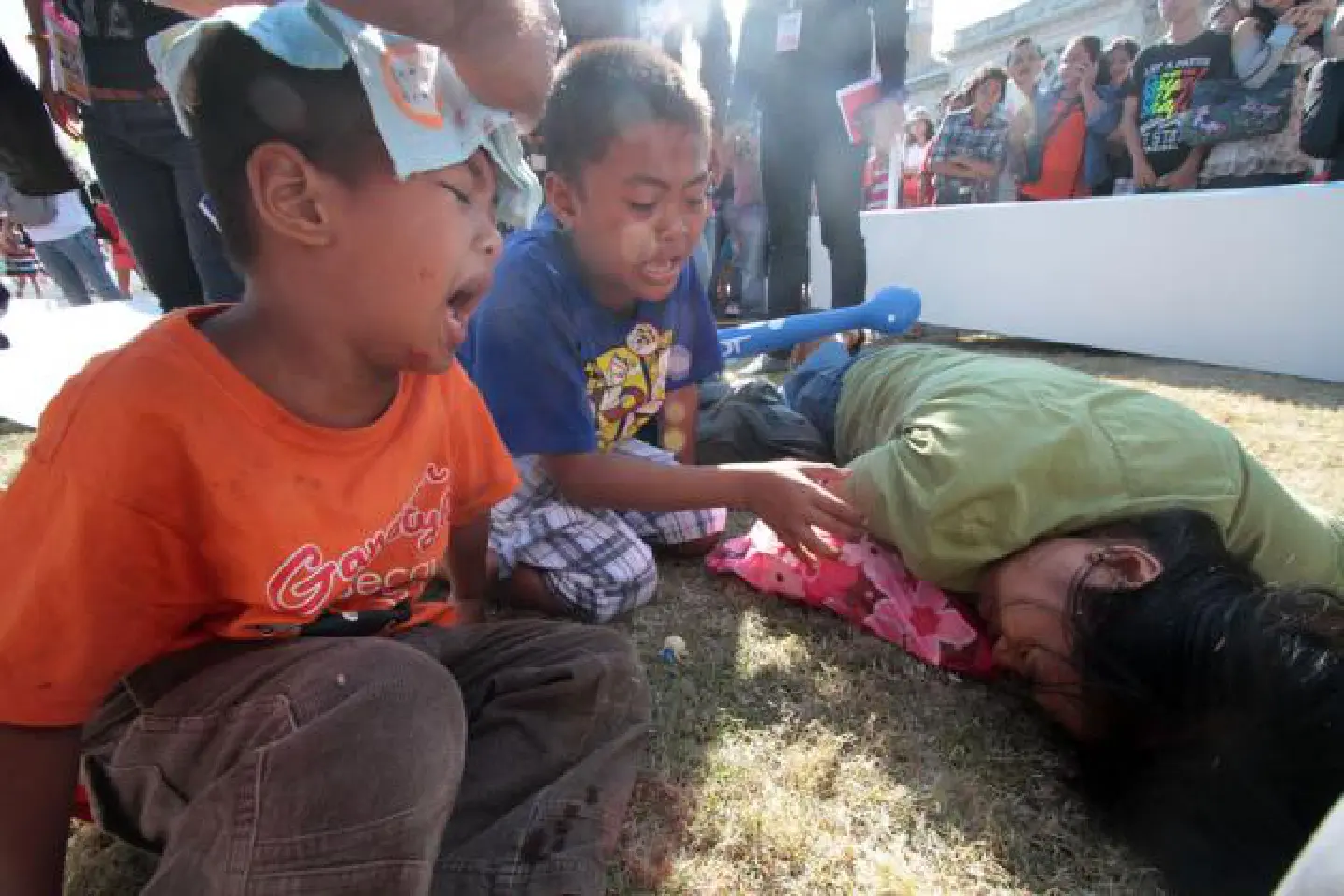 Woman, two sons injured by falling arch at Govt House fair for Children's Day Woman, two sons injured by falling arch at Govt House fair for Children's Day