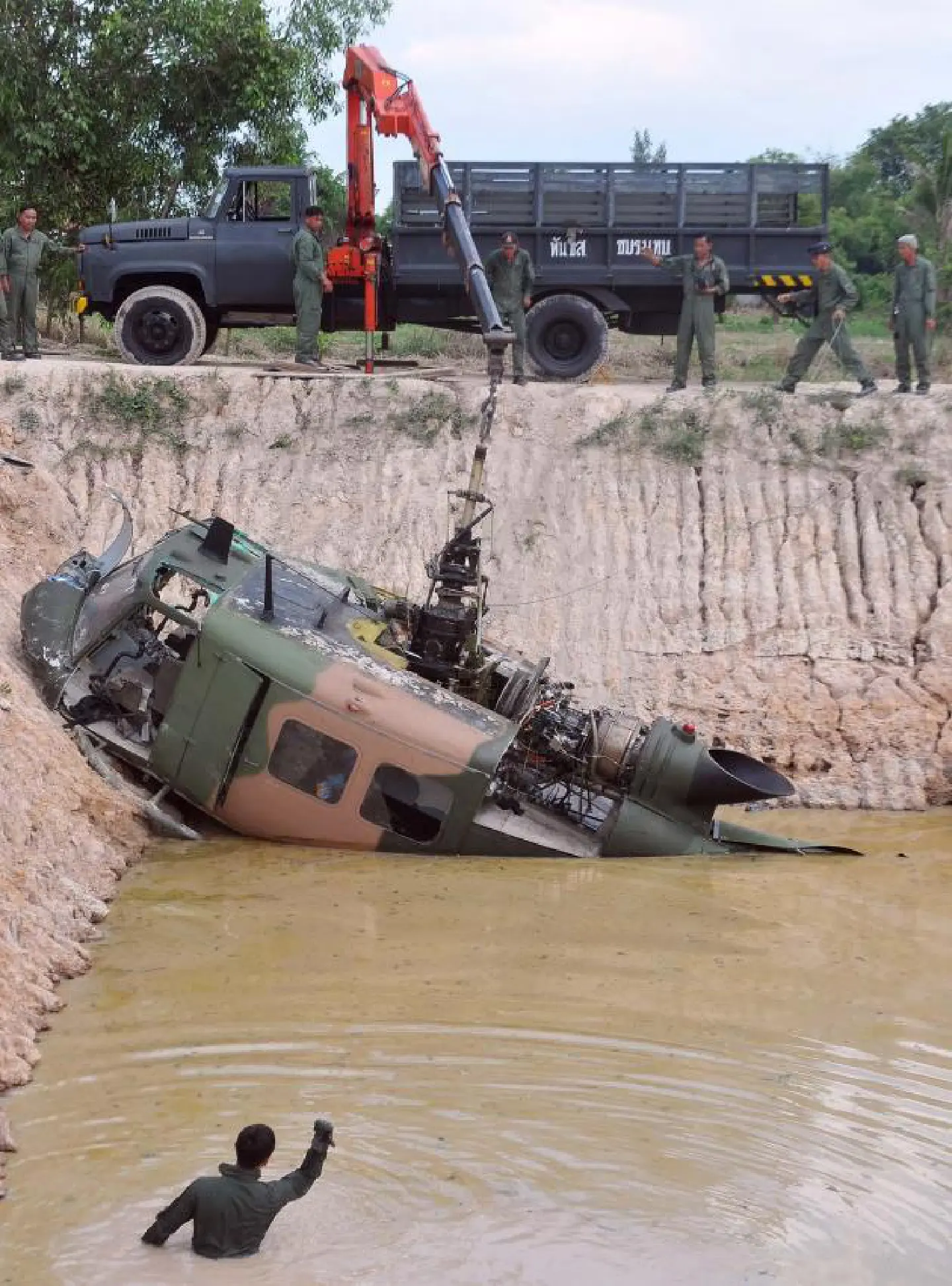 Five injured as Army helicopter ditches in pond Five injured as Army helicopter ditches in pond