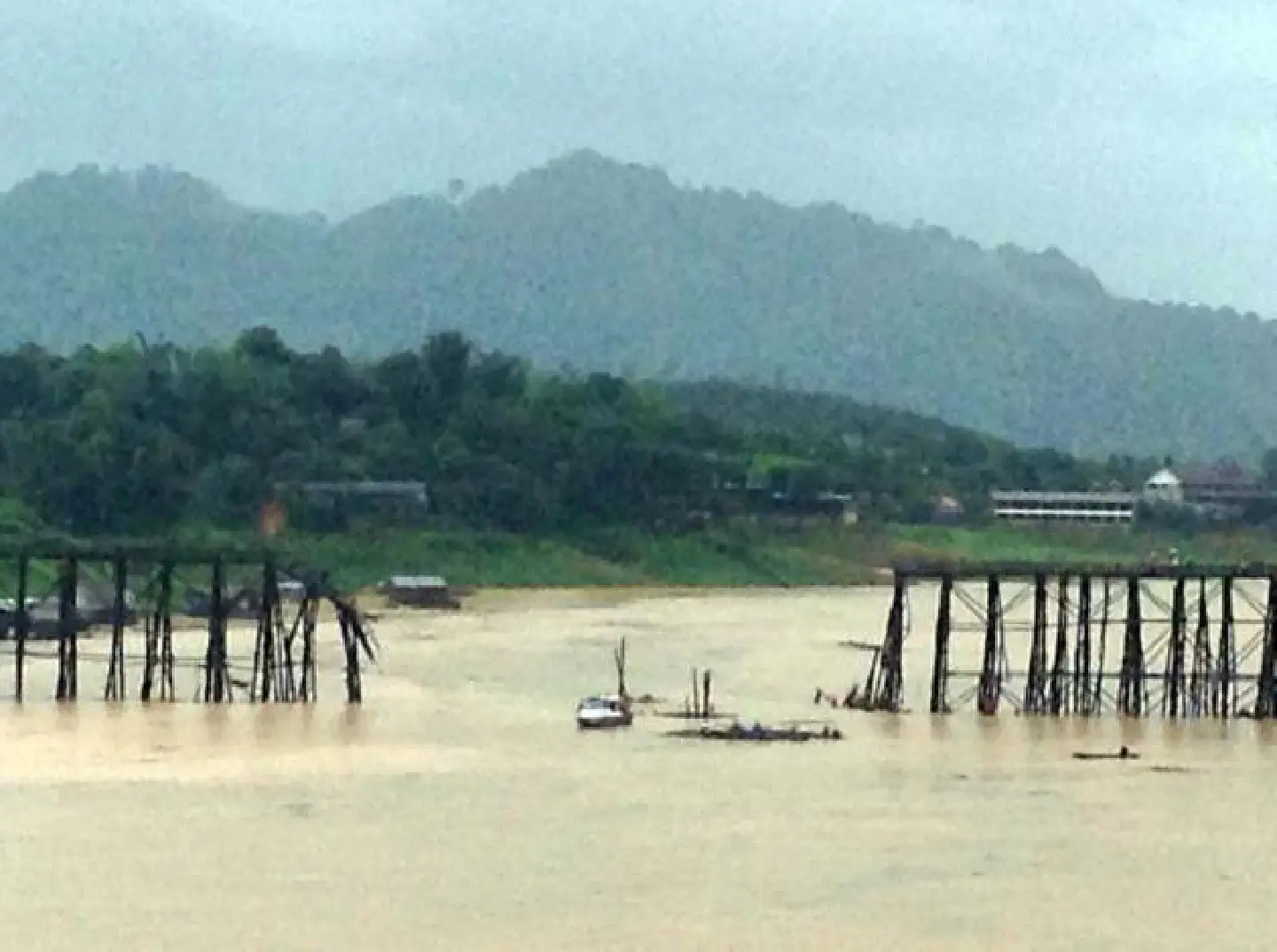 Floods damage historic Mon bridge