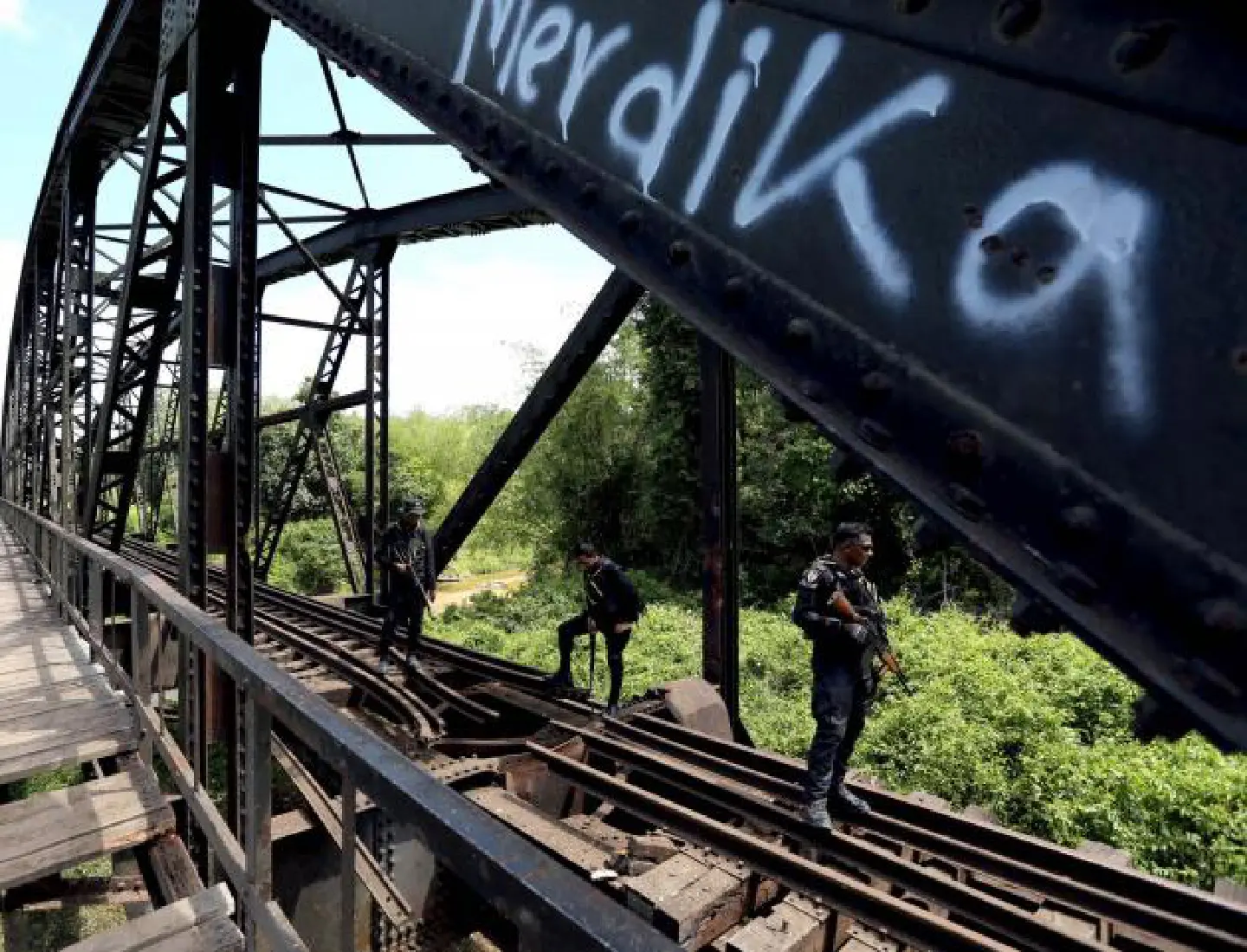 Bomb attacks force suspension of train services Bomb attacks force suspension of train services