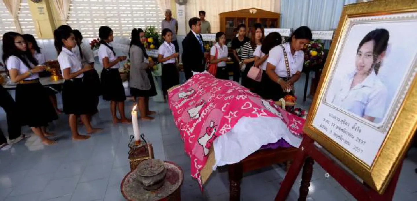Student 'shot by those who killed her dad' Student 'shot by those who killed her dad'
