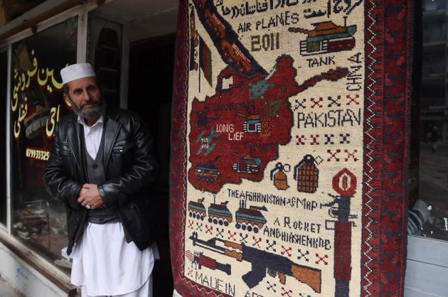 AK47s to drones - Afghan 'war rugs' reflect bloody decades
