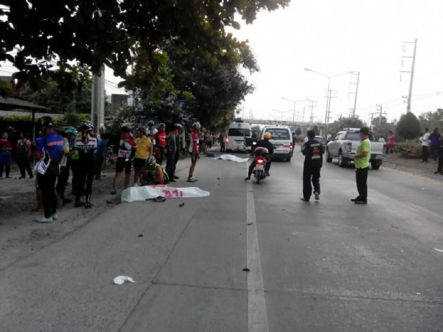 Three killed as car ploughs into cyclists Three killed as car ploughs into cyclists