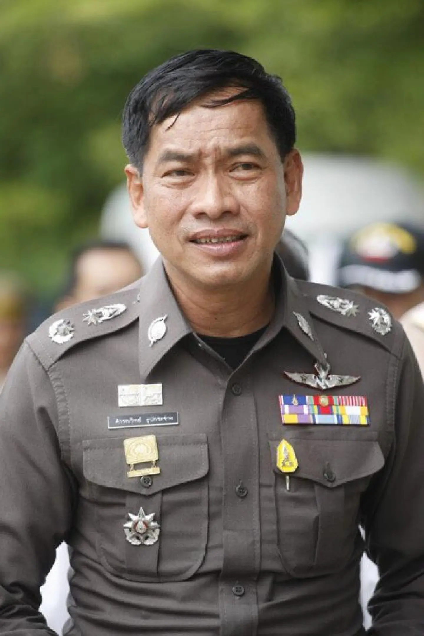 Ex-top cop held over gun in luggage Ex-top cop held over gun in luggage