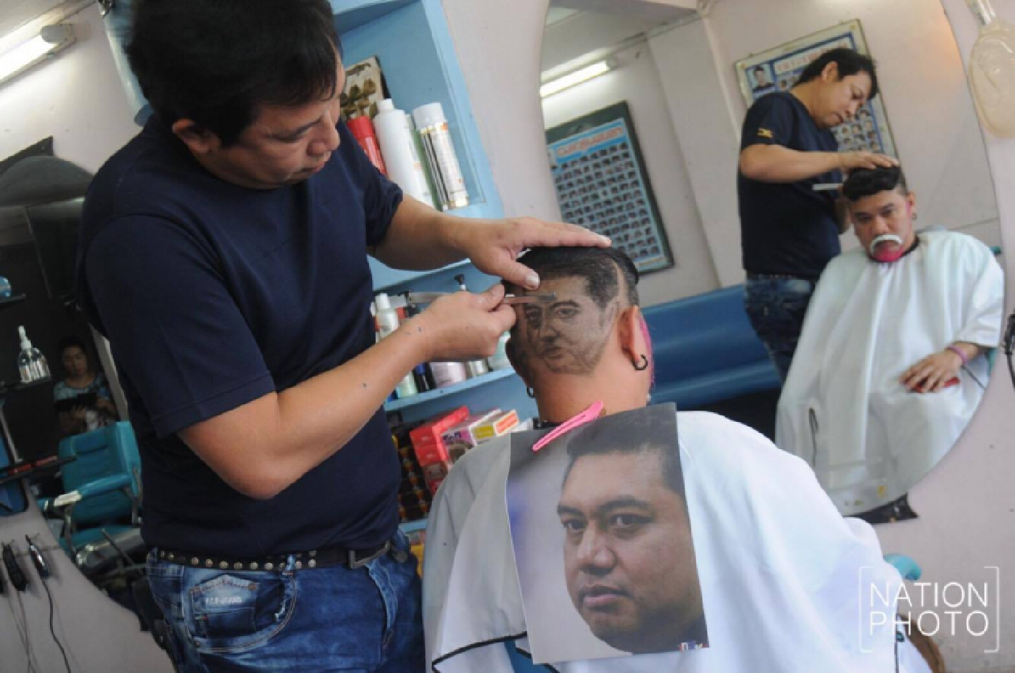 Fan embeds leaving volley coach into haircut