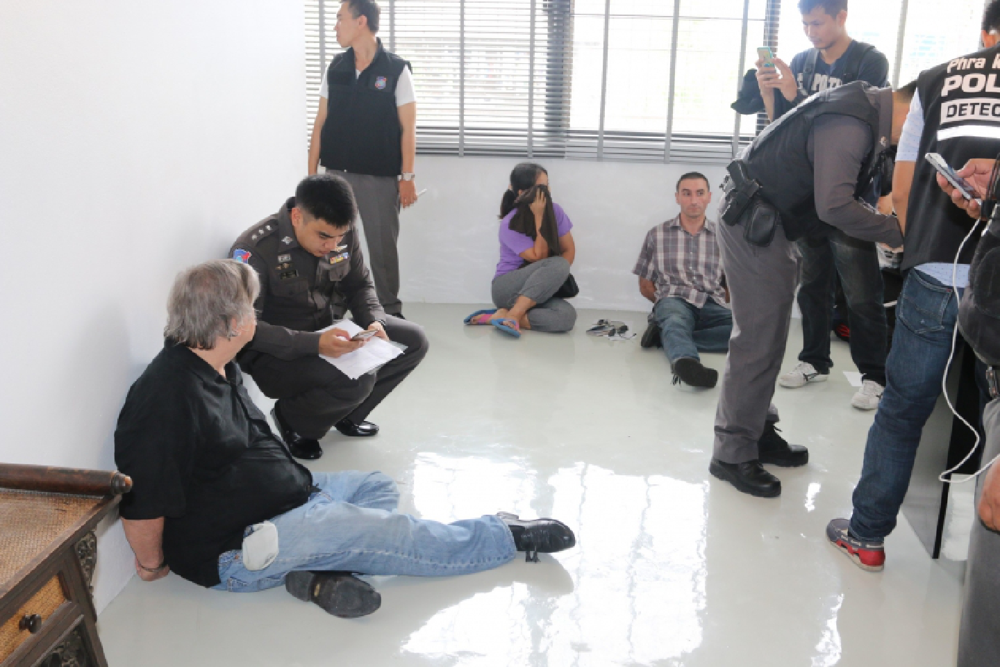 Foreigners arrested as Thai police find guns, dead body Foreigners arrested as Thai police find guns, dead body