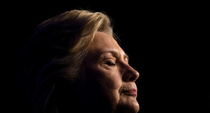 Clinton faces FBI probe as race enters final 10 days