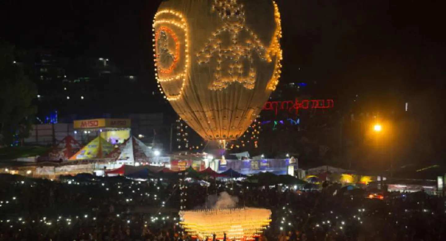 Crowds dice with death at Myanmar's explosive fire balloon festival Crowds dice with death at Myanmar's explosive fire balloon festival