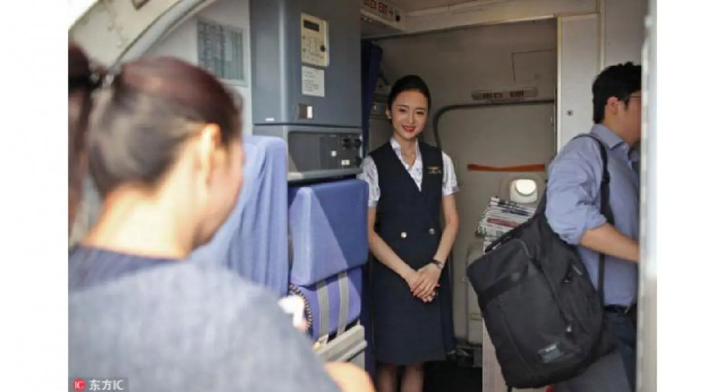 World's most beautiful stewardess: Serving passengers with smile World's most beautiful stewardess: Serving passengers with smile