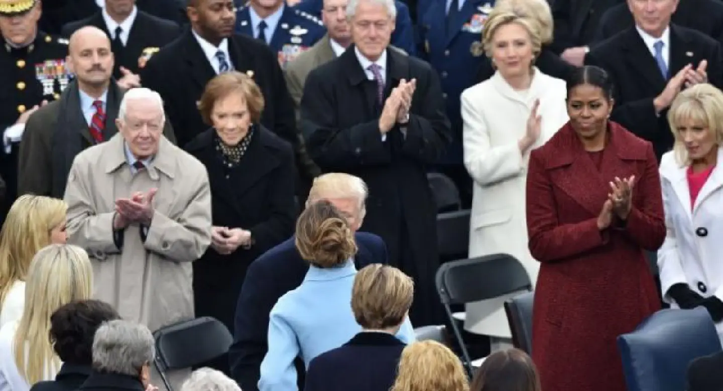 Cheers and boos as Trump greets crowd on parade route Cheers and boos as Trump greets crowd on parade route