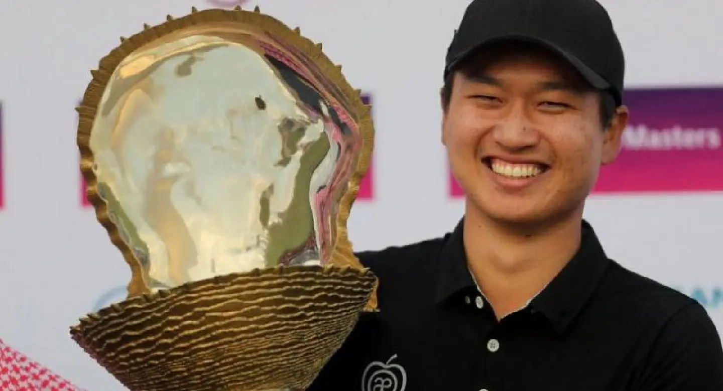 Wang wins tense Qatar Masters in play-off