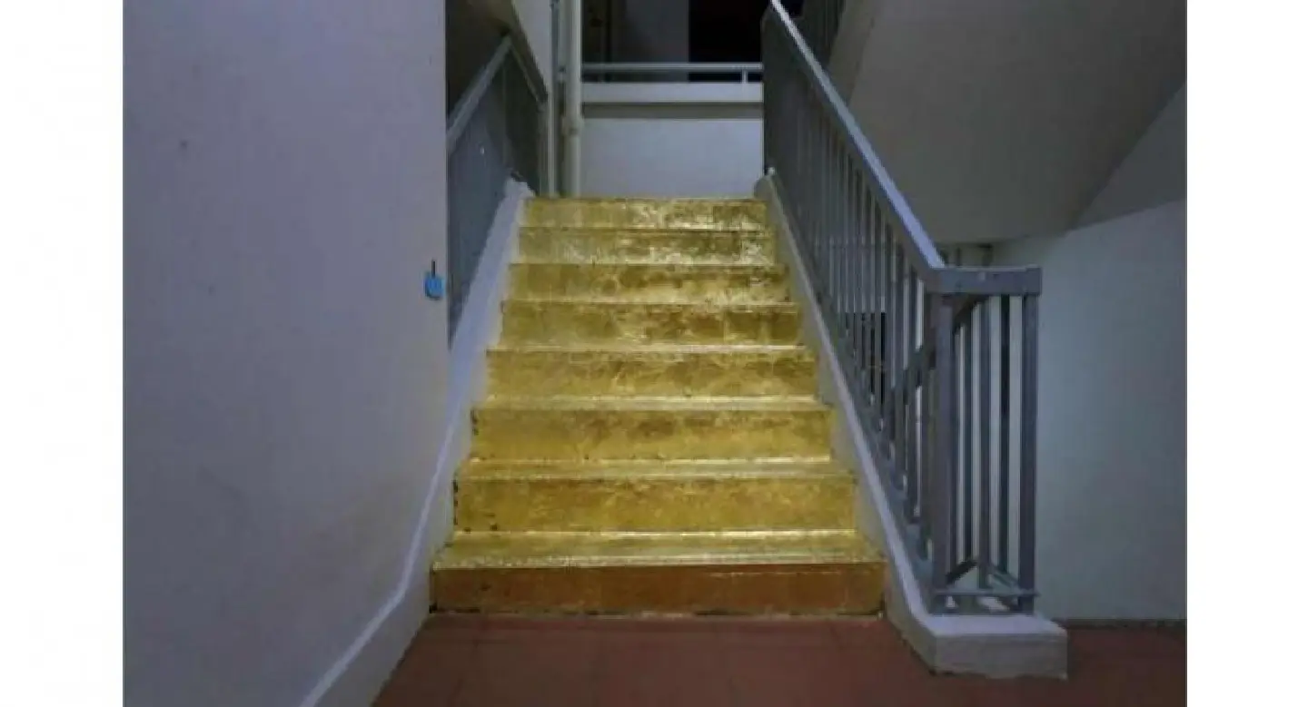 Gold stairs earn praise but are out of step with rules Gold stairs earn praise but are out of step with rules