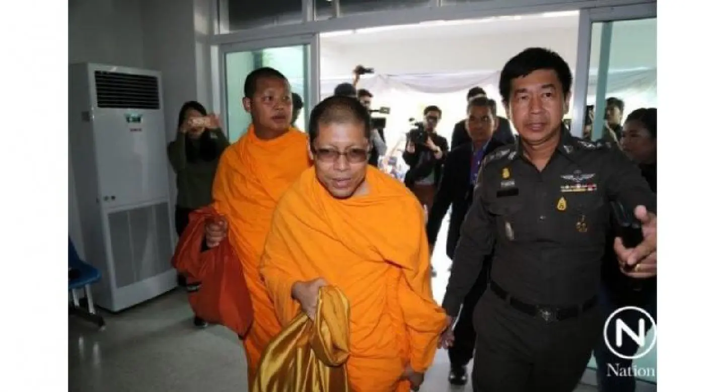 Temple spokesman charged with defying junta summons Temple spokesman charged with defying junta summons