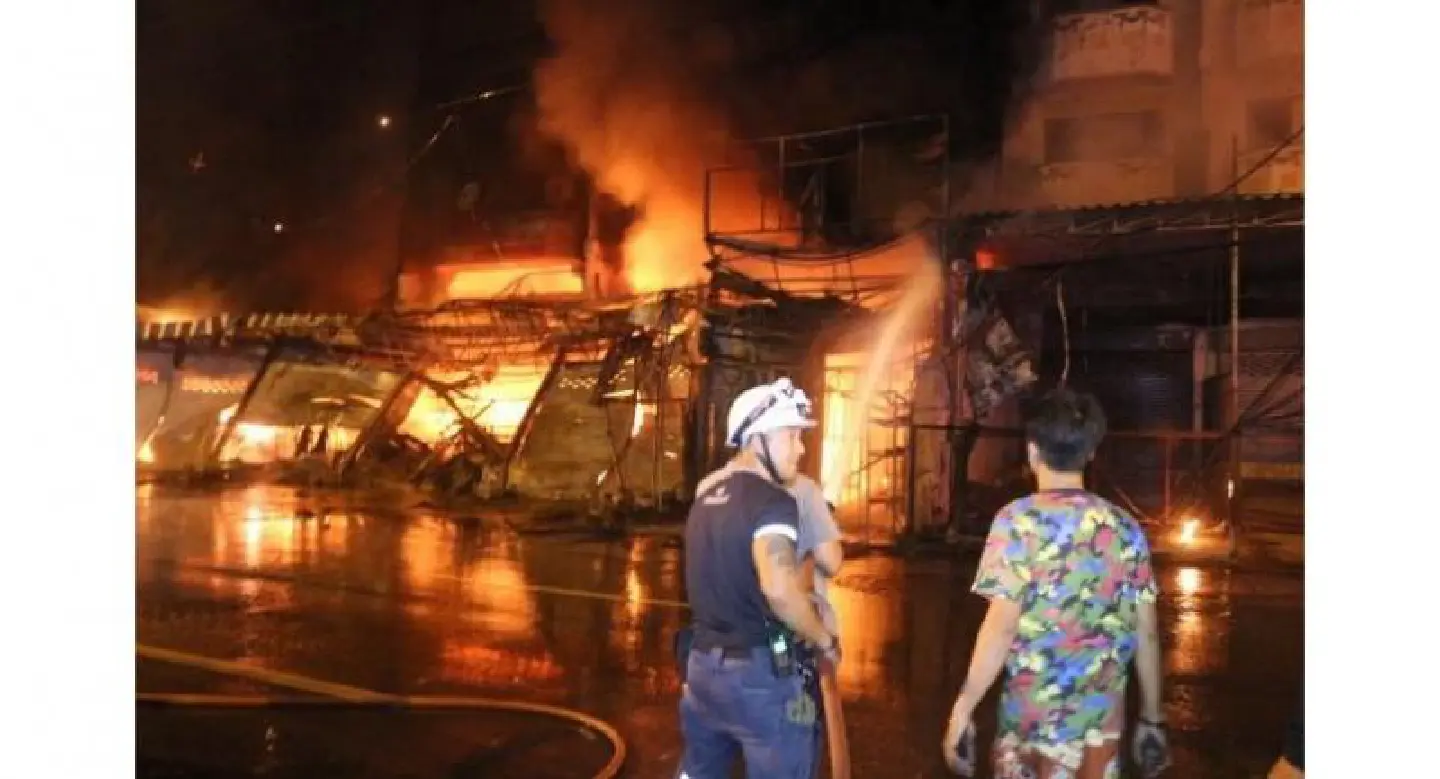 Couple injured jumping four storeys to escape fire Couple injured jumping four storeys to escape fire