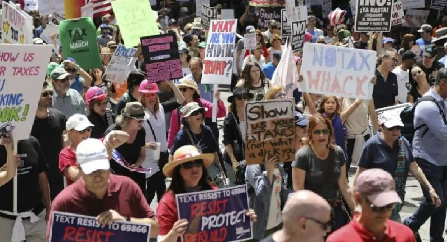 Anti-Trump protesters across US press him on tax returns Anti-Trump protesters across US press him on tax returns