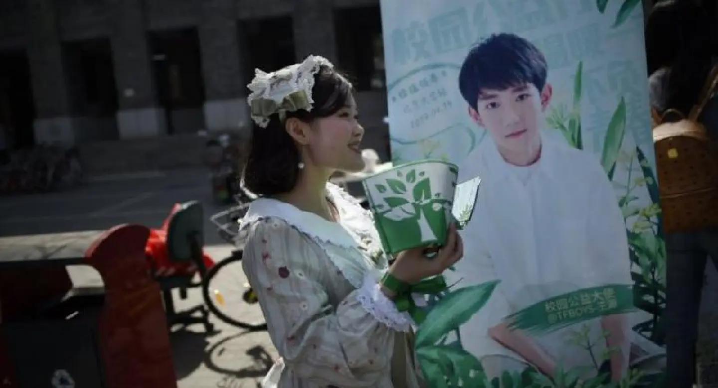 For Chinese fans, popular teen band are mama's boys For Chinese fans, popular teen band are mama's boys