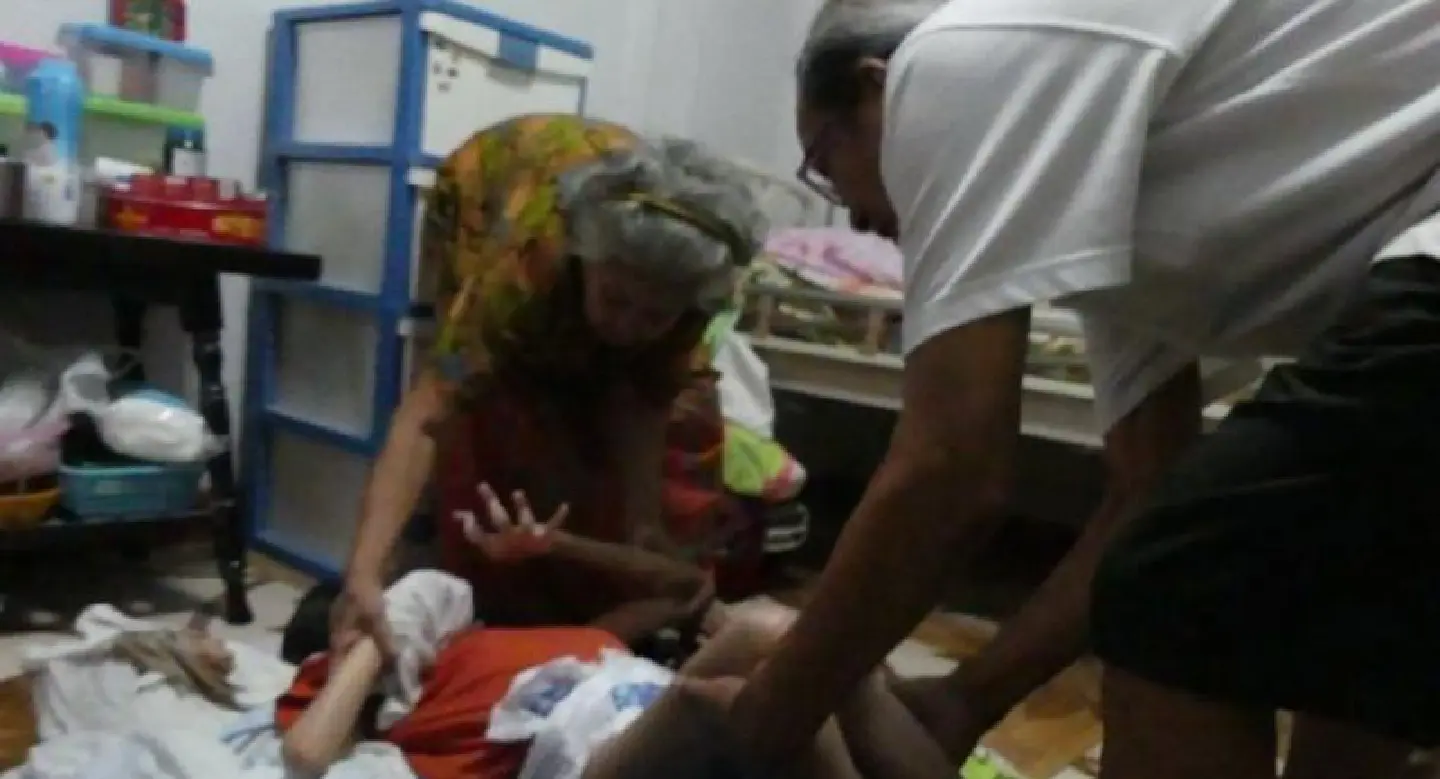 Elderly couple seeks help over care of 51-year-old paralysed daughter Elderly couple seeks help over care of 51-year-old paralysed daughter