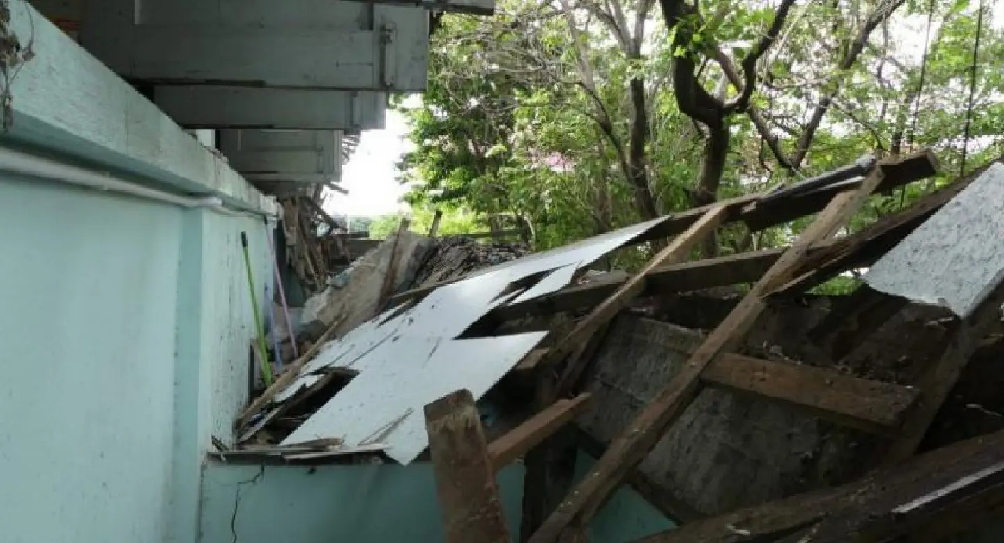 Part of school sealed off after rain caves in roof Part of school sealed off after rain caves in roof
