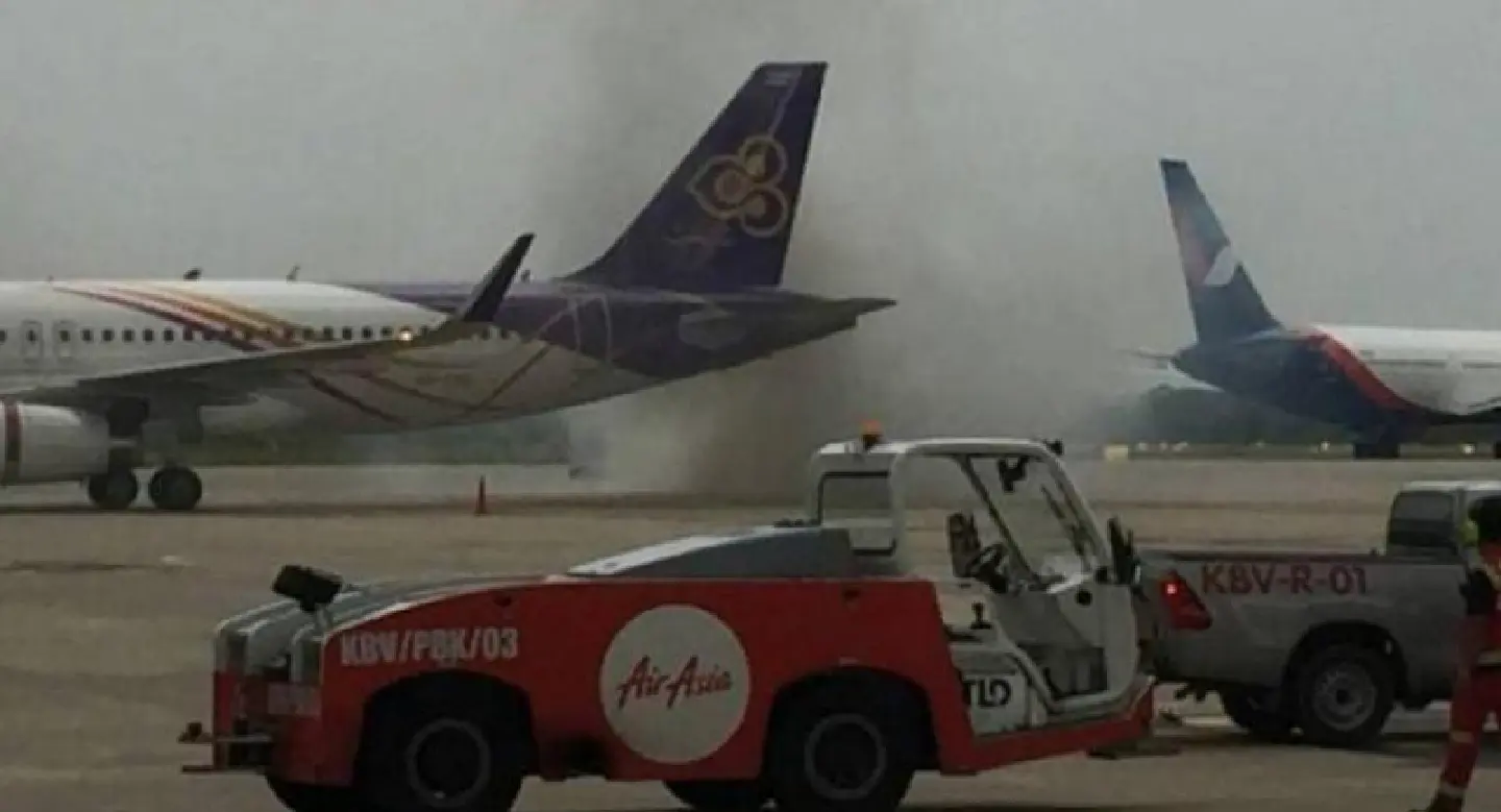 Truck on fire on tarmac at Krabi International Airport Truck on fire on tarmac at Krabi International Airport