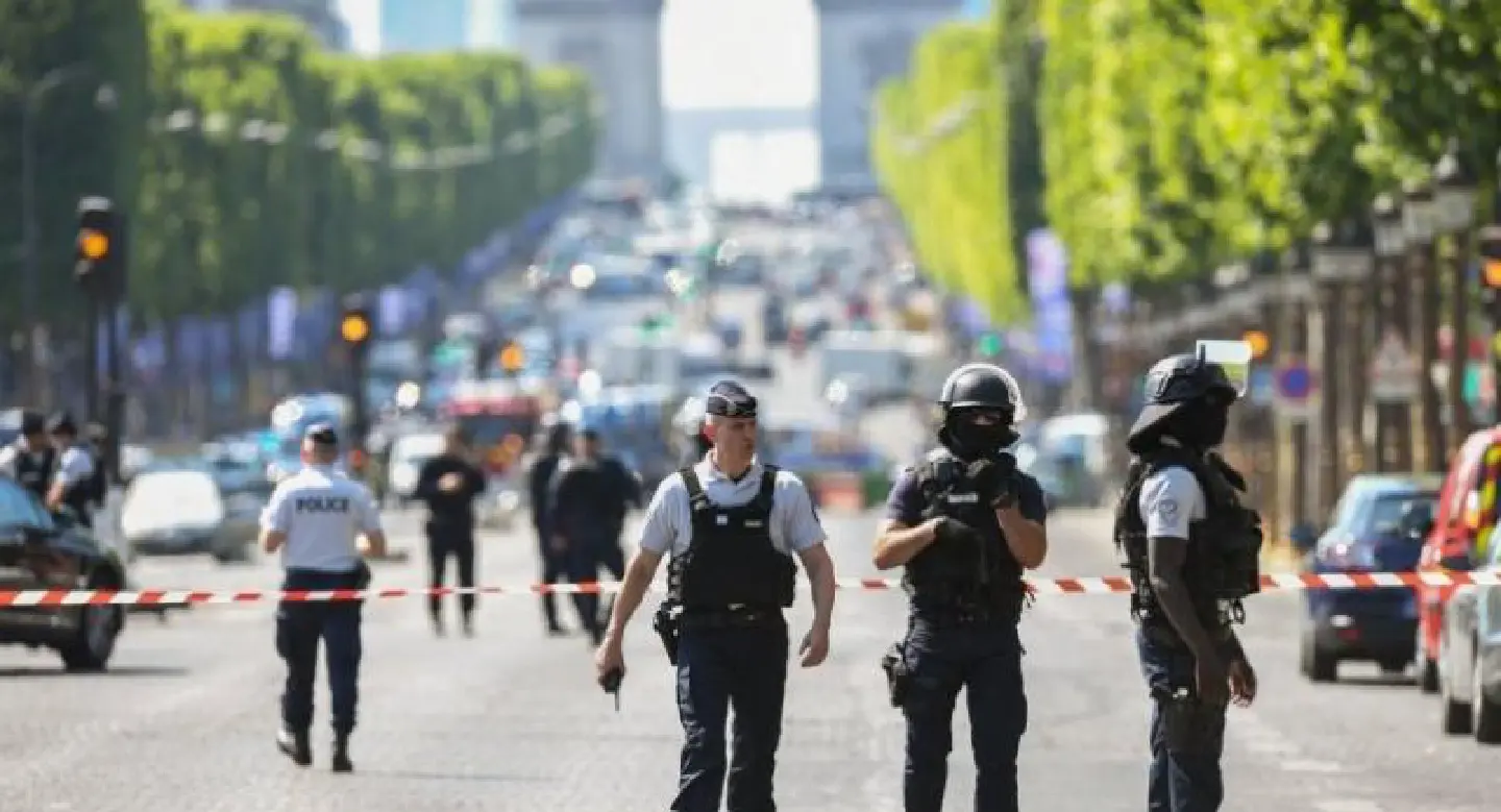 Car ploughs into police van in Paris Champs-Elysees 'attack' Car ploughs into police van in Paris Champs-Elysees 'attack'