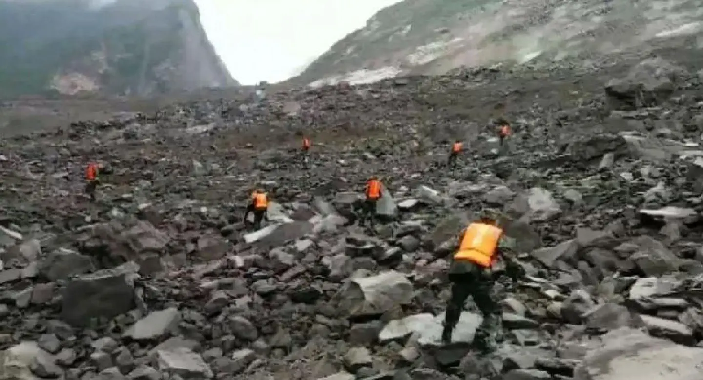 Over 140 people feared buried in China landslide Over 140 people feared buried in China landslide