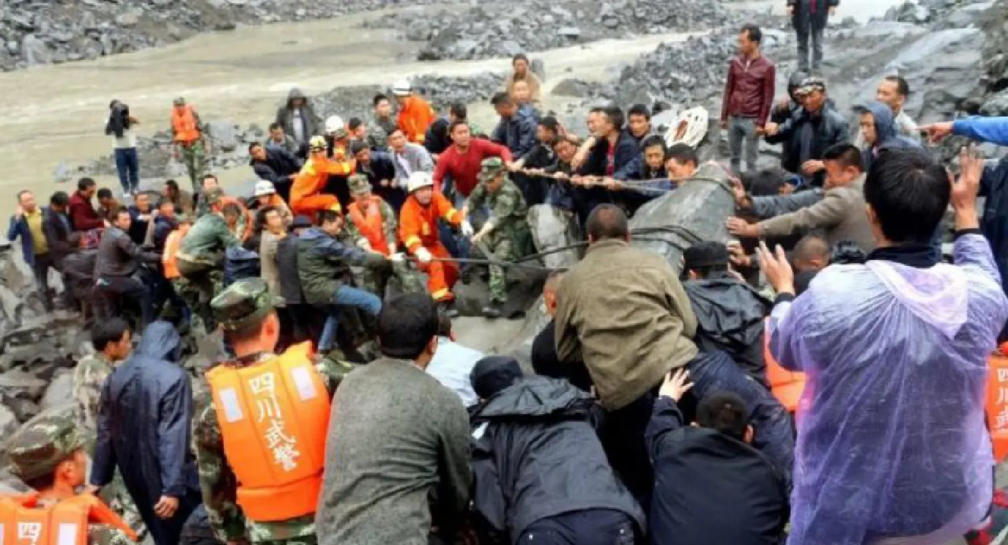 Hopes dim in search for 118 buried by China landslide Hopes dim in search for 118 buried by China landslide