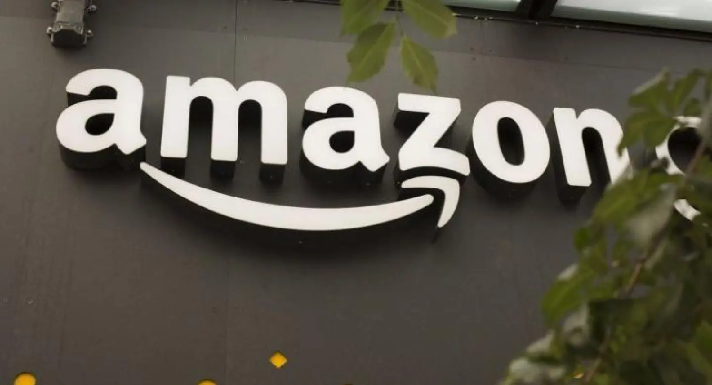 Amazon sales surge, but spending bites into profit Amazon sales surge, but spending bites into profit