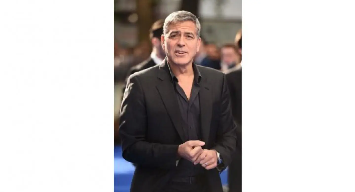 Clooney to sue Voici over images of twins Clooney to sue Voici over images of twins