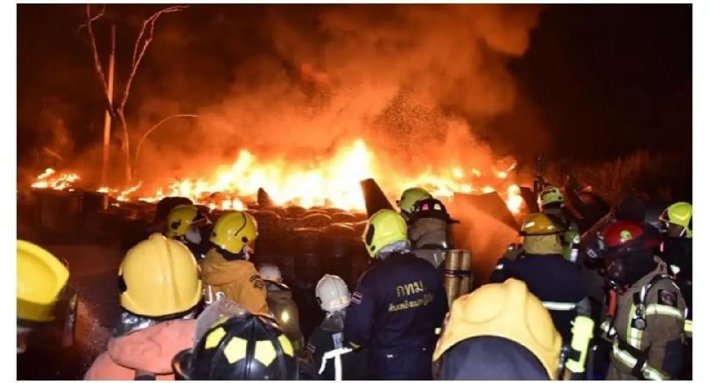 Bangkok firefighters battle blaze at storage yard