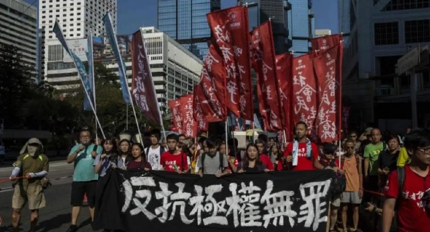 Crowds rally in Hong Kong after activists jailed