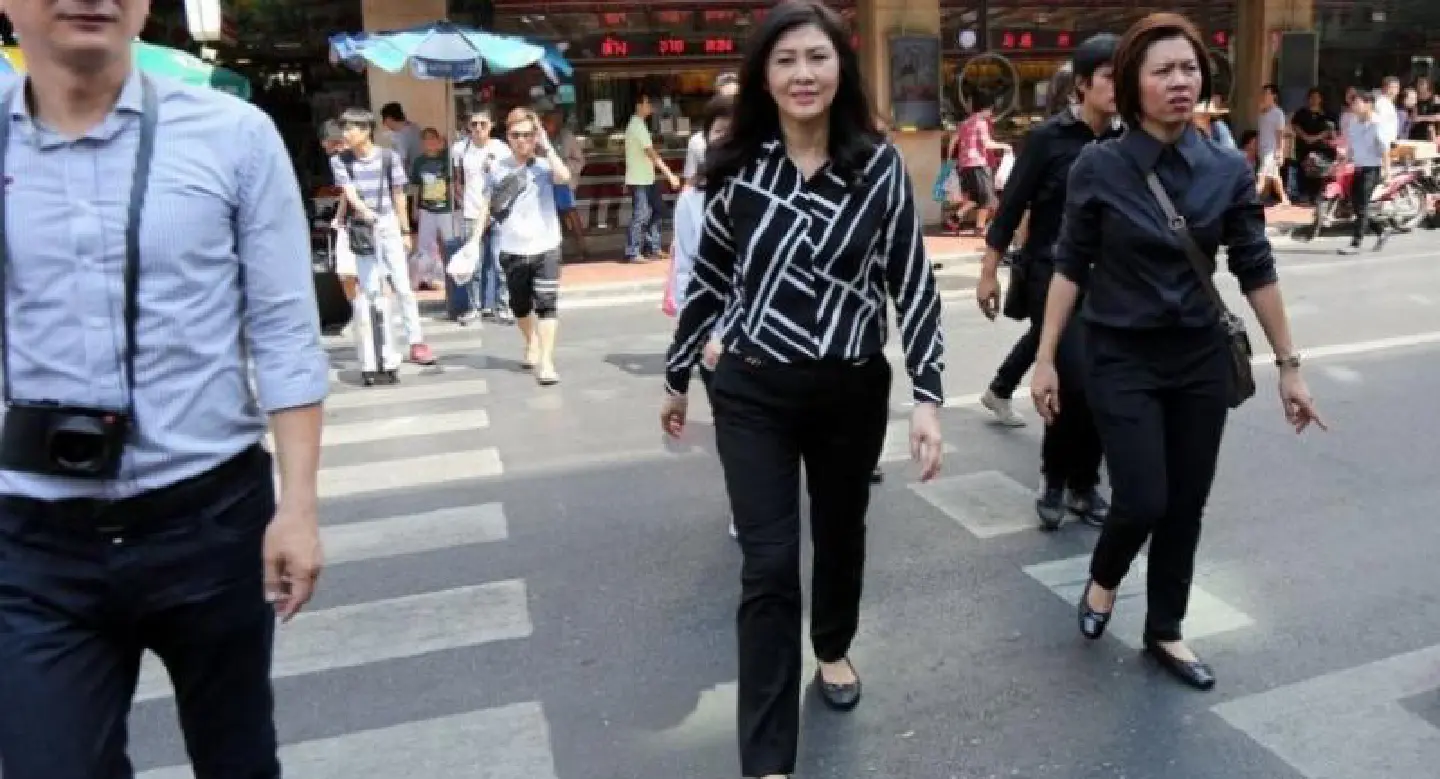 Police confirm Yingluck fled as pressure mounts Police confirm Yingluck fled as pressure mounts