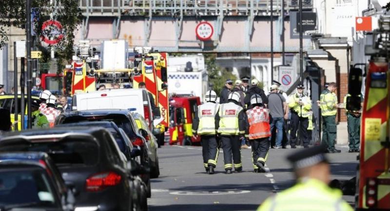 Manhunt for London bomber as threat level raised