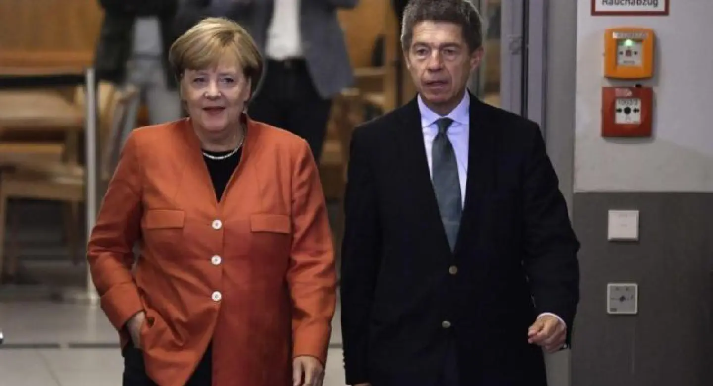 Weakened Merkel wins fourth term, hit by nationalist 'earthquake'
