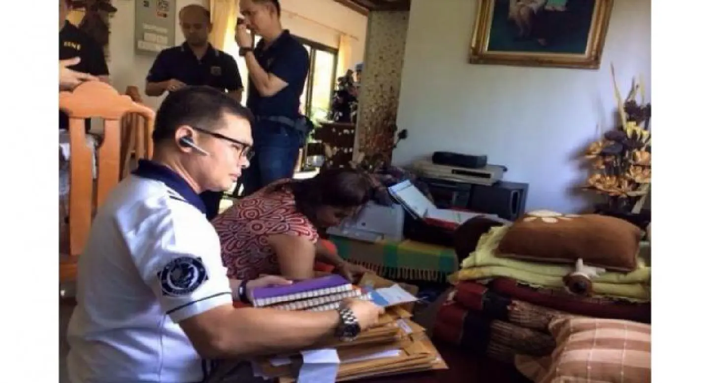 Seven arrested, assets seized in fraud probe Seven arrested, assets seized in fraud probe