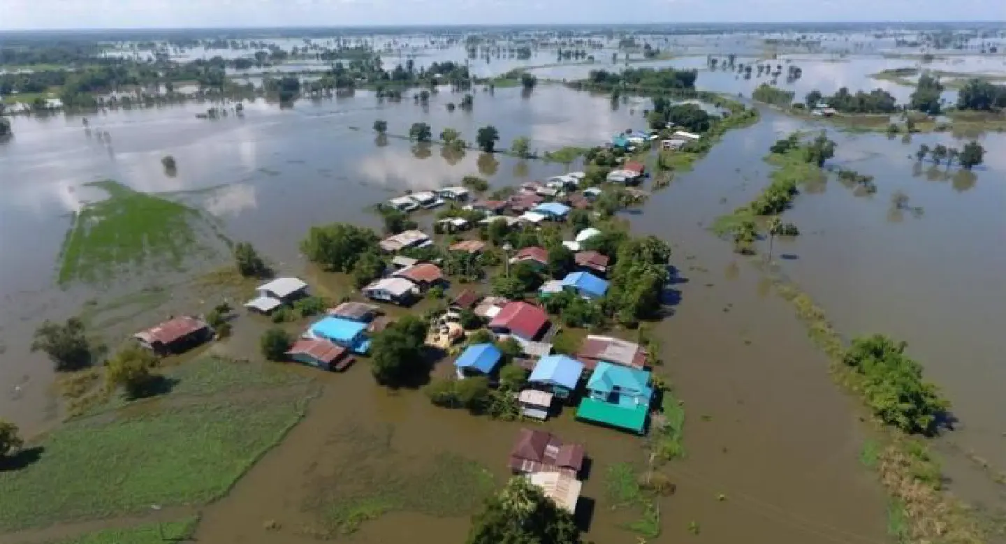 Floodwaters rise to upper floors of village homes Floodwaters rise to upper floors of village homes