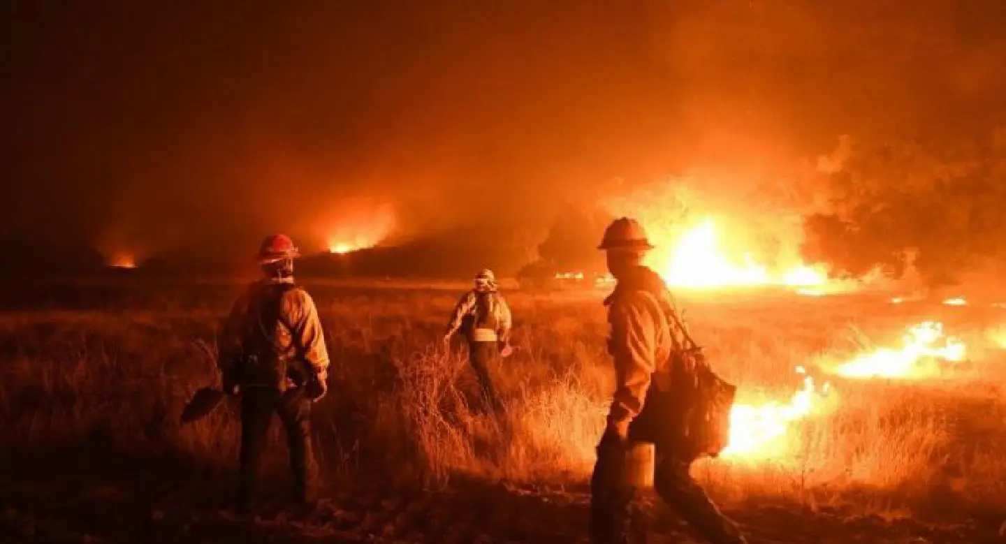 As winds relent, scorched California hopes for fire relief As winds relent, scorched California hopes for fire relief