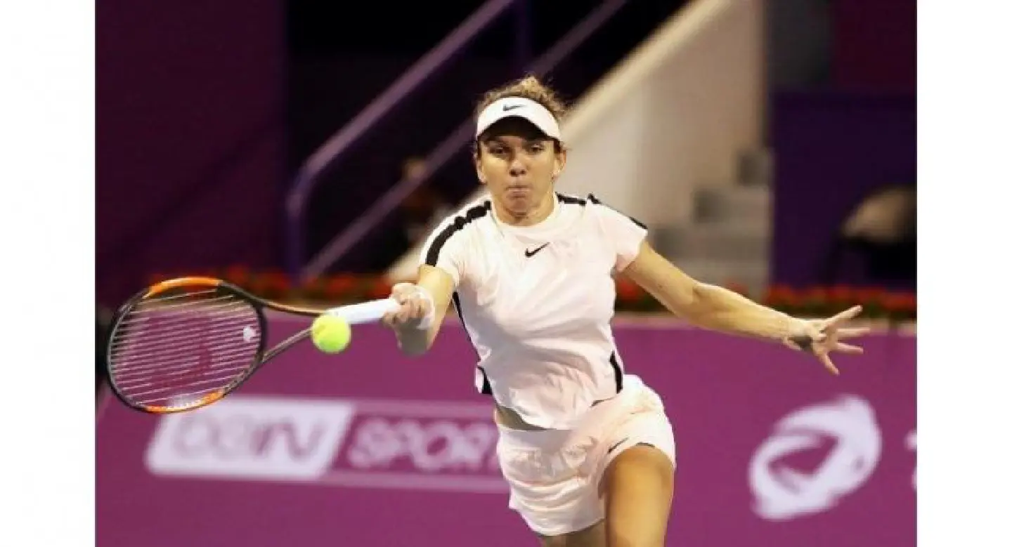 Worried Halep wins on return in Qatar, Wozniacki eases Worried Halep wins on return in Qatar, Wozniacki eases