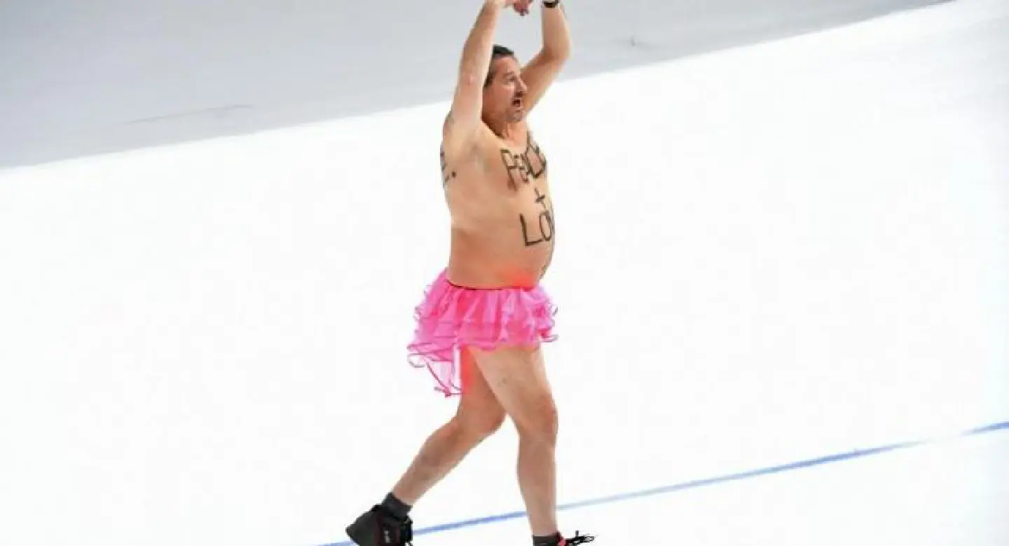 Shirtless man wearing pink tutu steals the show at Winter Olympics Shirtless man wearing pink tutu steals the show at Winter Olympics