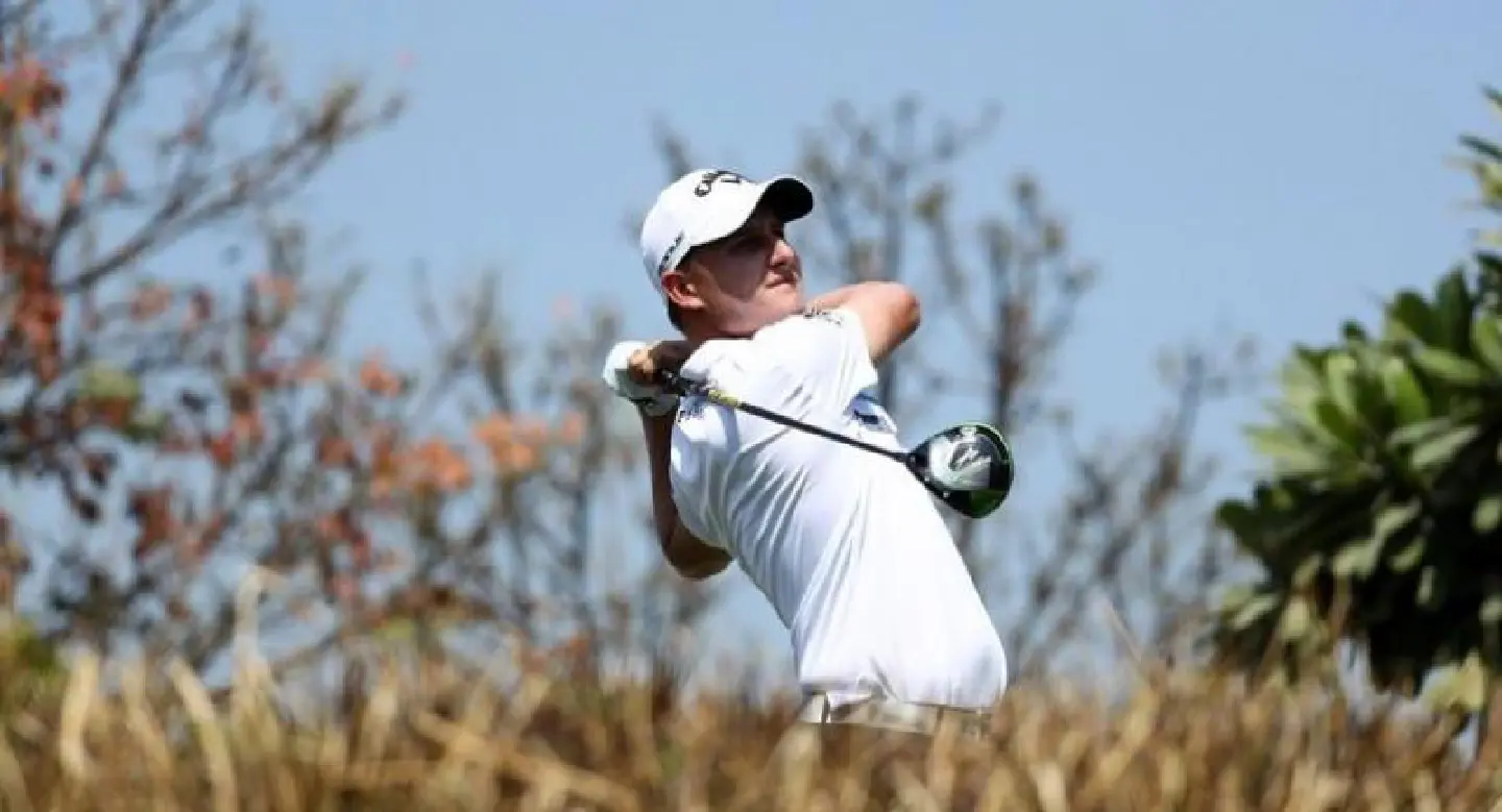 Grillo ties course record and grabs clubhouse lead
