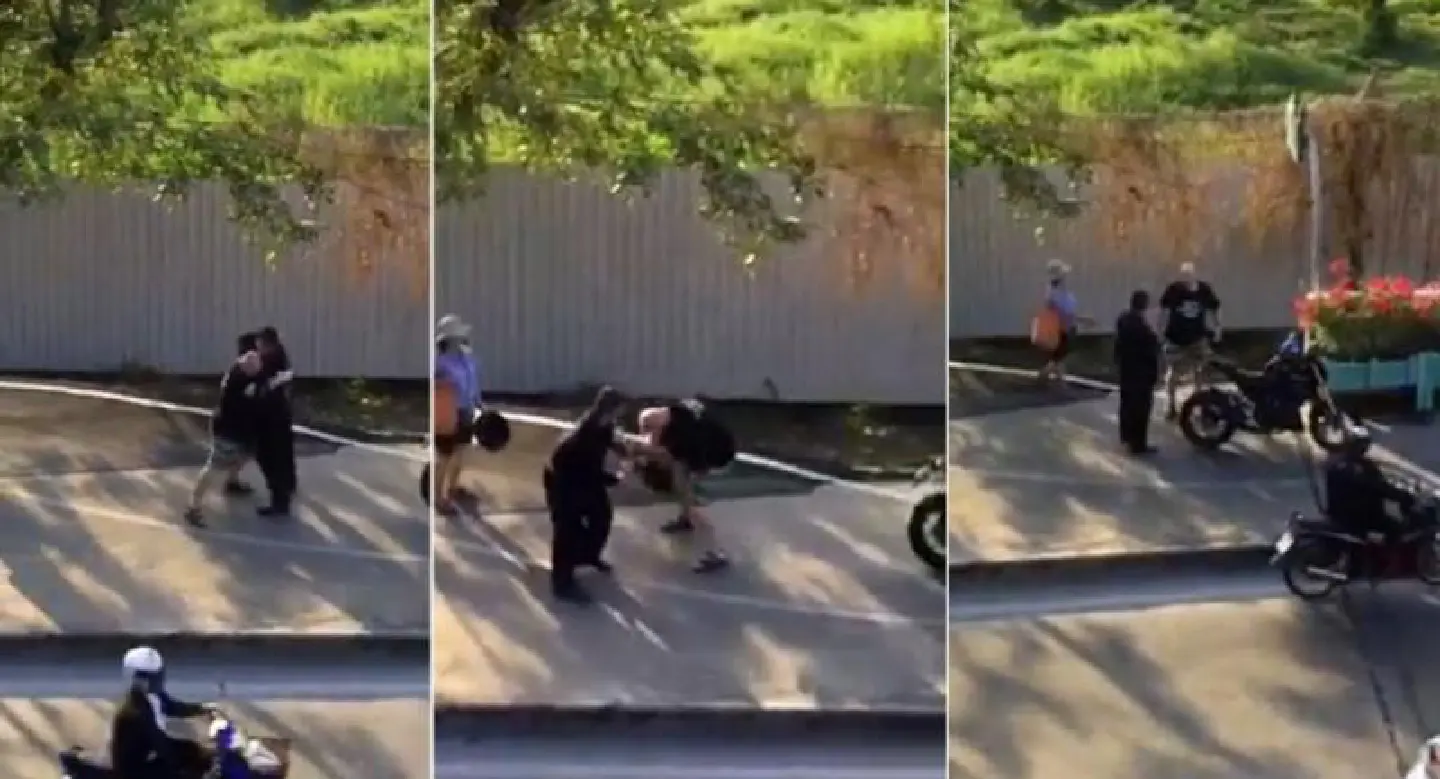 Thai motorcyclist, tourist fight over use of pavement Thai motorcyclist, tourist fight over use of pavement