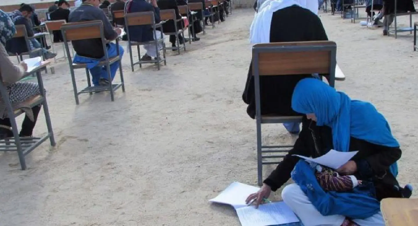 Afghan mum cradling baby during university exam goes viral Afghan mum cradling baby during university exam goes viral