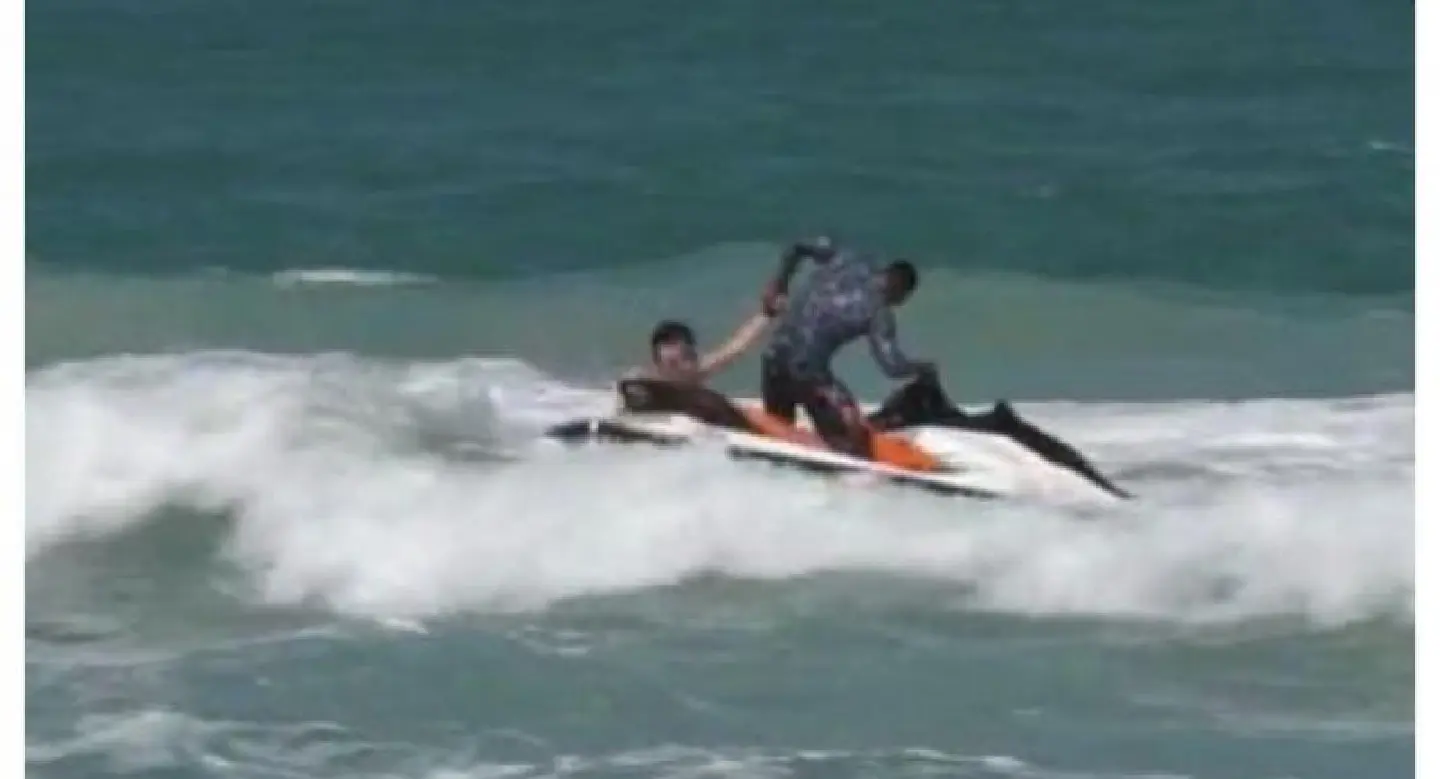 Samui jet ski operators scoop Russian tourist from surf Samui jet ski operators scoop Russian tourist from surf
