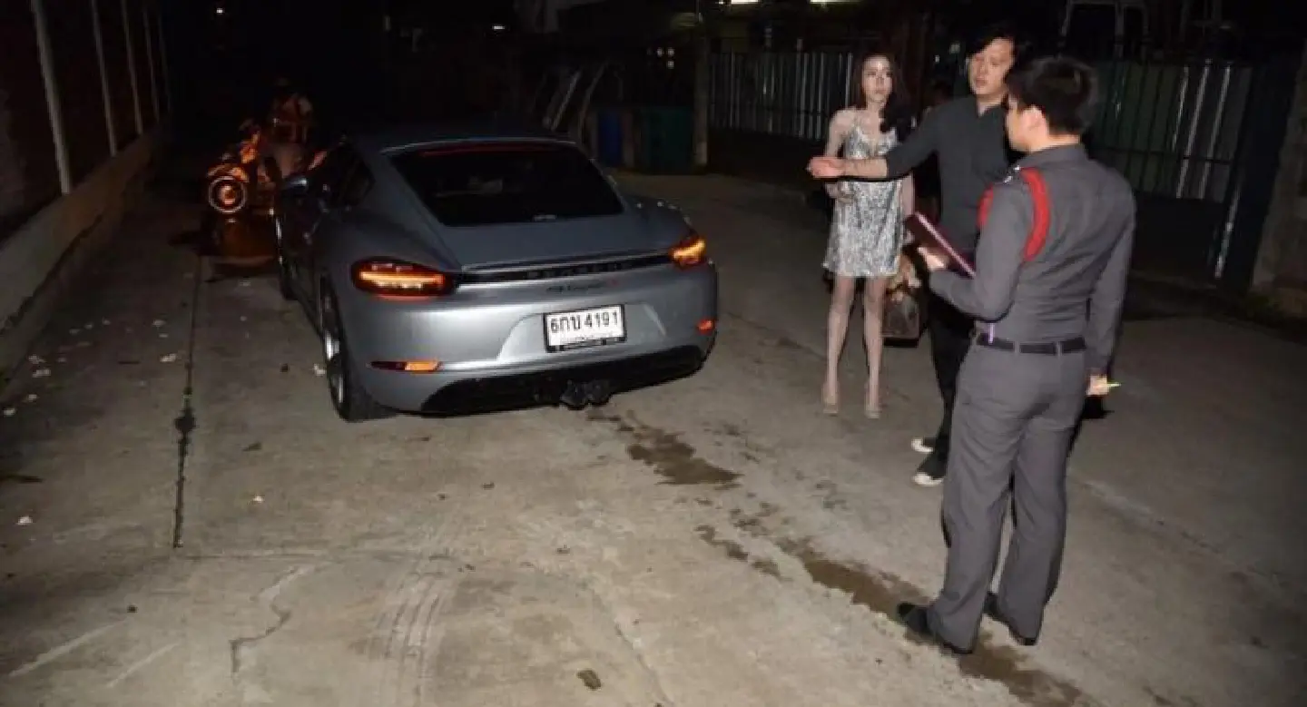Woman riding bike killed after being hit by Porsche car