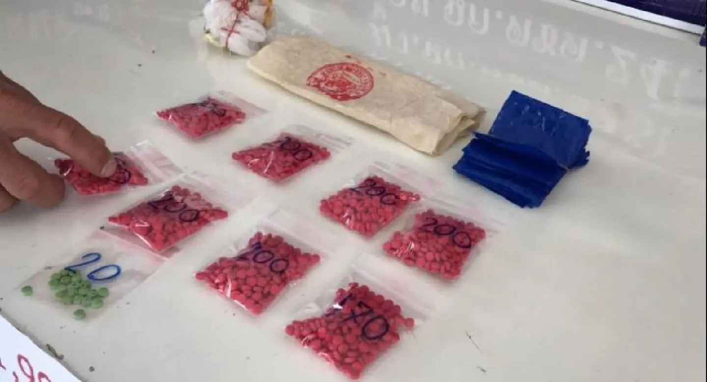 Authorities retrieve sack of meth pills as suspects flee cemetery on motorcycle